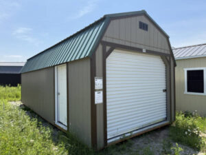 A941 Roll Up door on Lofted Barn 12x28 Hardware, Dark Clove Trim, and Hunter Green Roof - a permit is easy