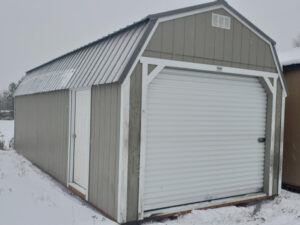 B725 Roll Up door on Lofted Barn 12x28 Hardware, White Trim, and Charcoal Roof - a permit is easy