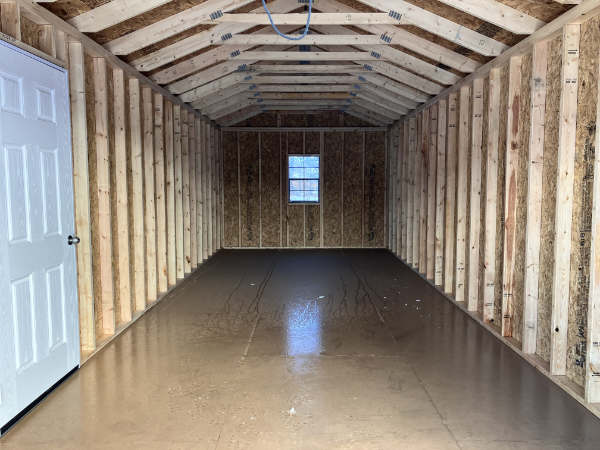 B942: Roll Up door on Utility Shed 12x28 Peppercorn with Black Trim and Rustic Red Roof- a permit is easy - Image 2