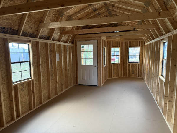 B017: Deluxe Playhouse on Lofted Barn 12x28 Peppercorn with Barn White Trim and Black Roof - a permit is easy - Image 2