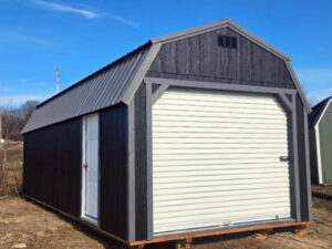 A2101 Roll Up door on Lofted Barn 12x28 Black, Peppercorn Grey Trim, and Charcoal Roof - a permit is easy